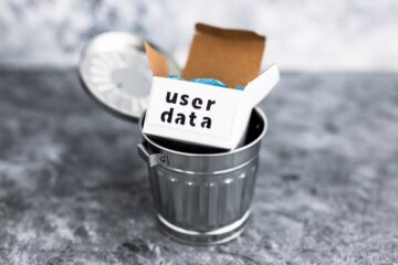 trash can with box of user data. Orange Country business law