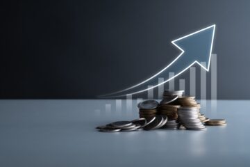 coins with arrow going up; business lawyer orange county