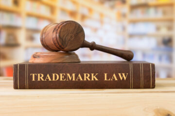 book wit trademark law written on it; Orange county business law