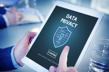 Data privacy words on an ipad screen; business law